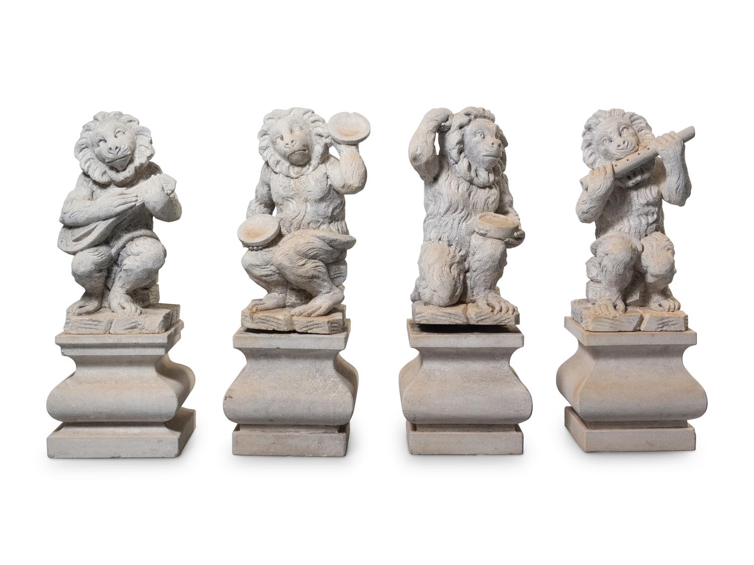 A Set of Four Italian Limestone Figures of Monkey Musicians