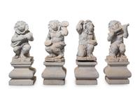 A Set of Four Italian Limestone Figures of Monkey Musicians