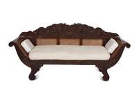 A British Colonial Carved Mahogany and Cane Work Settee