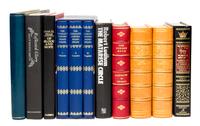 (BINDINGS) A collection of books, largely leather-bound.