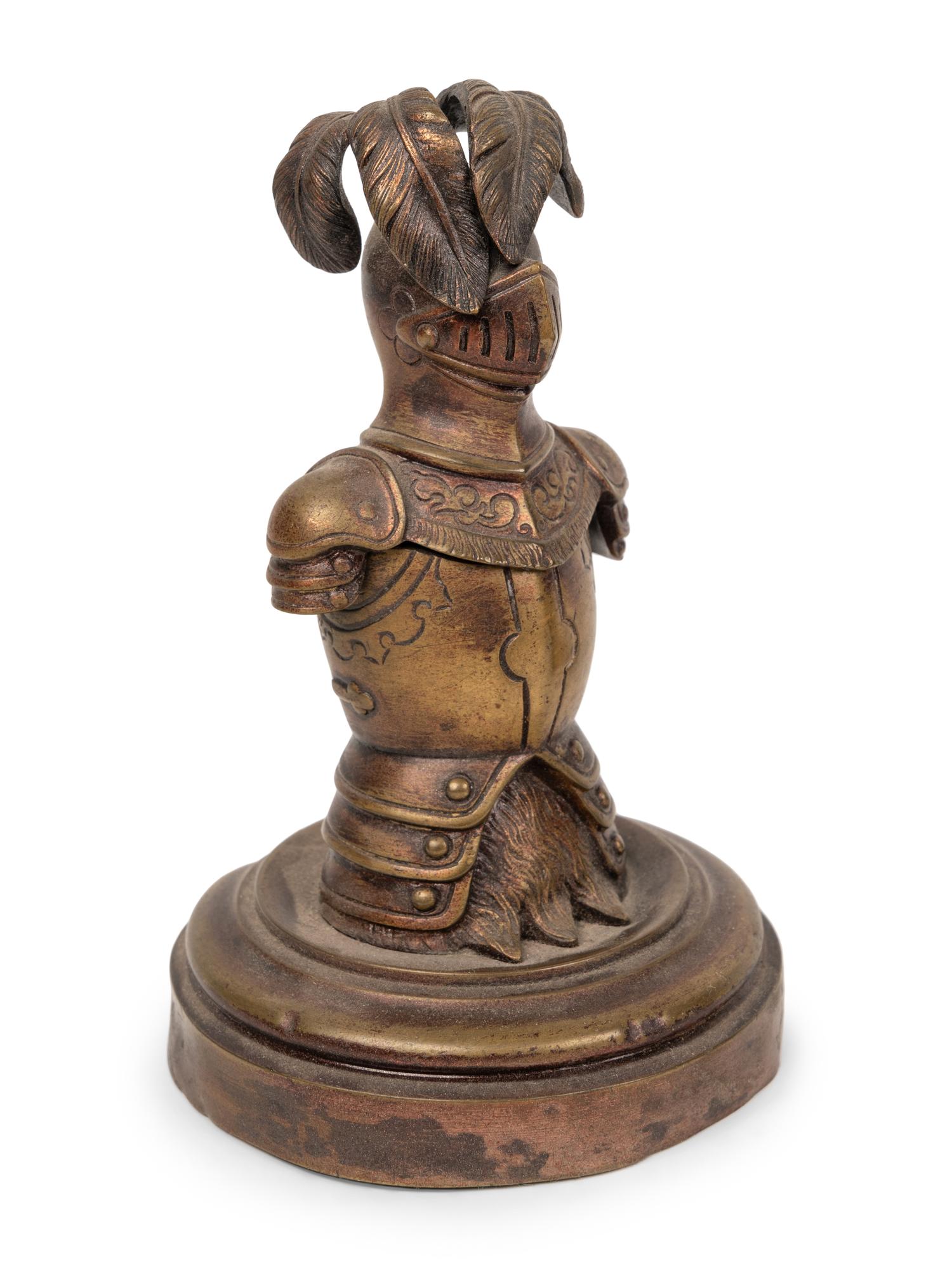 Two Knight Inkwells and a Helmet Inkwell