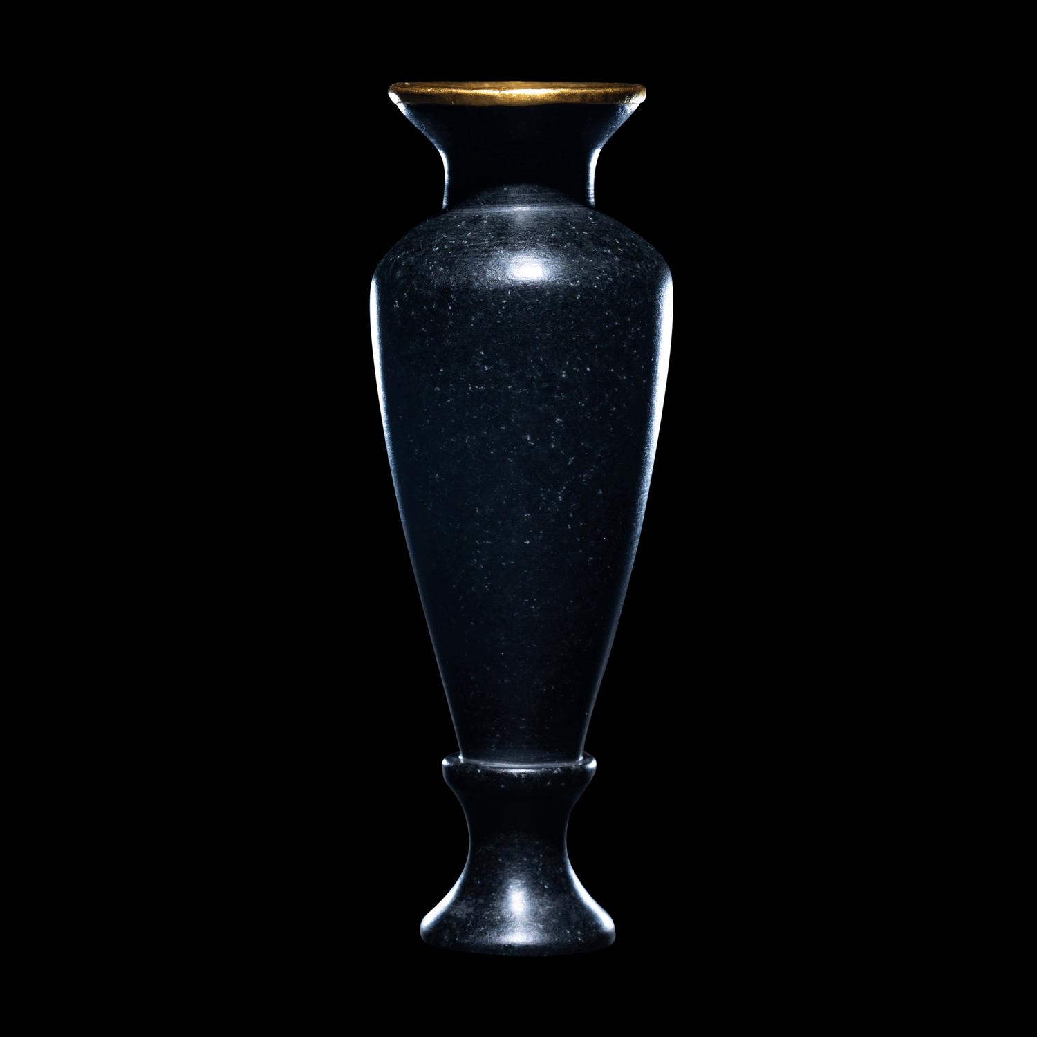 An Egyptian Obsidian and Gold Alabastron