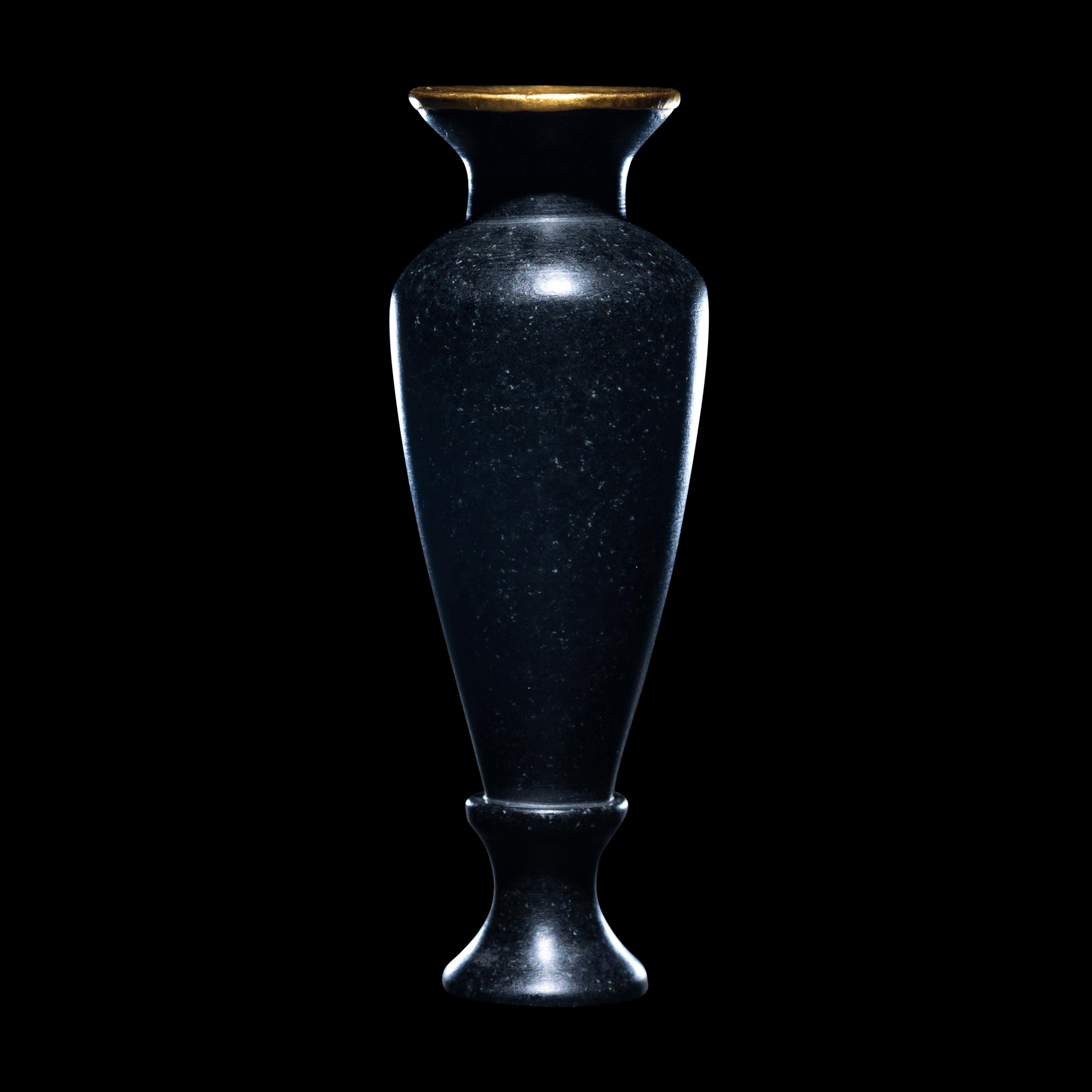 An Egyptian Obsidian and Gold Alabastron