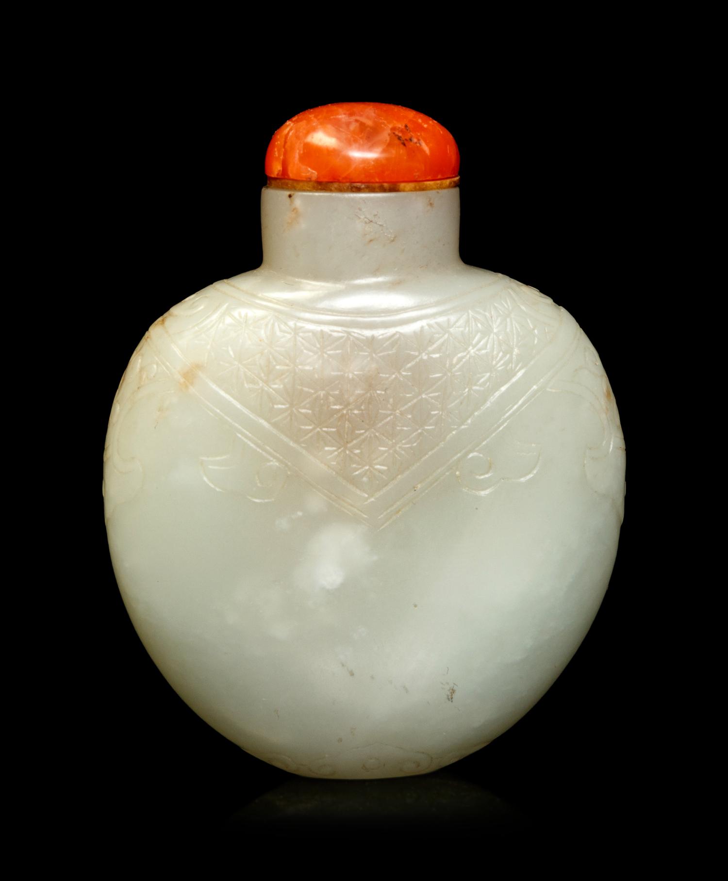 A Carved White Jade Snuff Bottle
