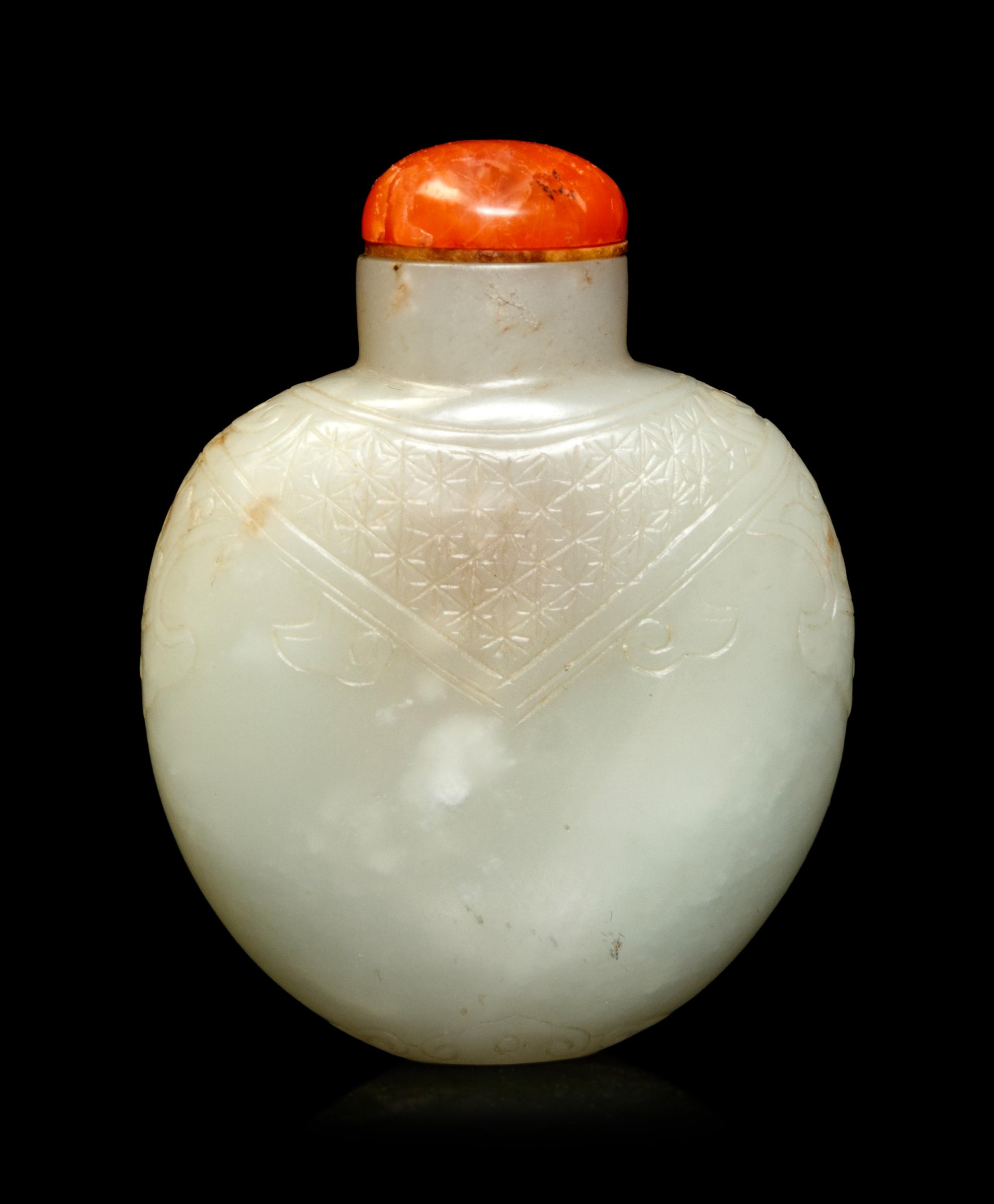 A Carved White Jade Snuff Bottle