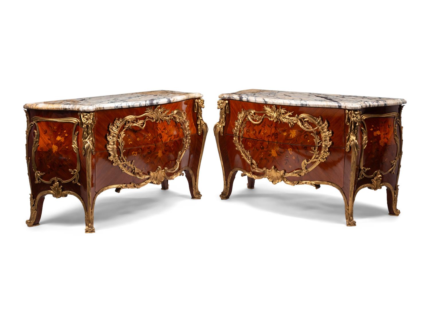 A Pair of Louis XV Style Gilt Bronze Mounted Kingwood and Floral Marquetry Marble-Top Commodes