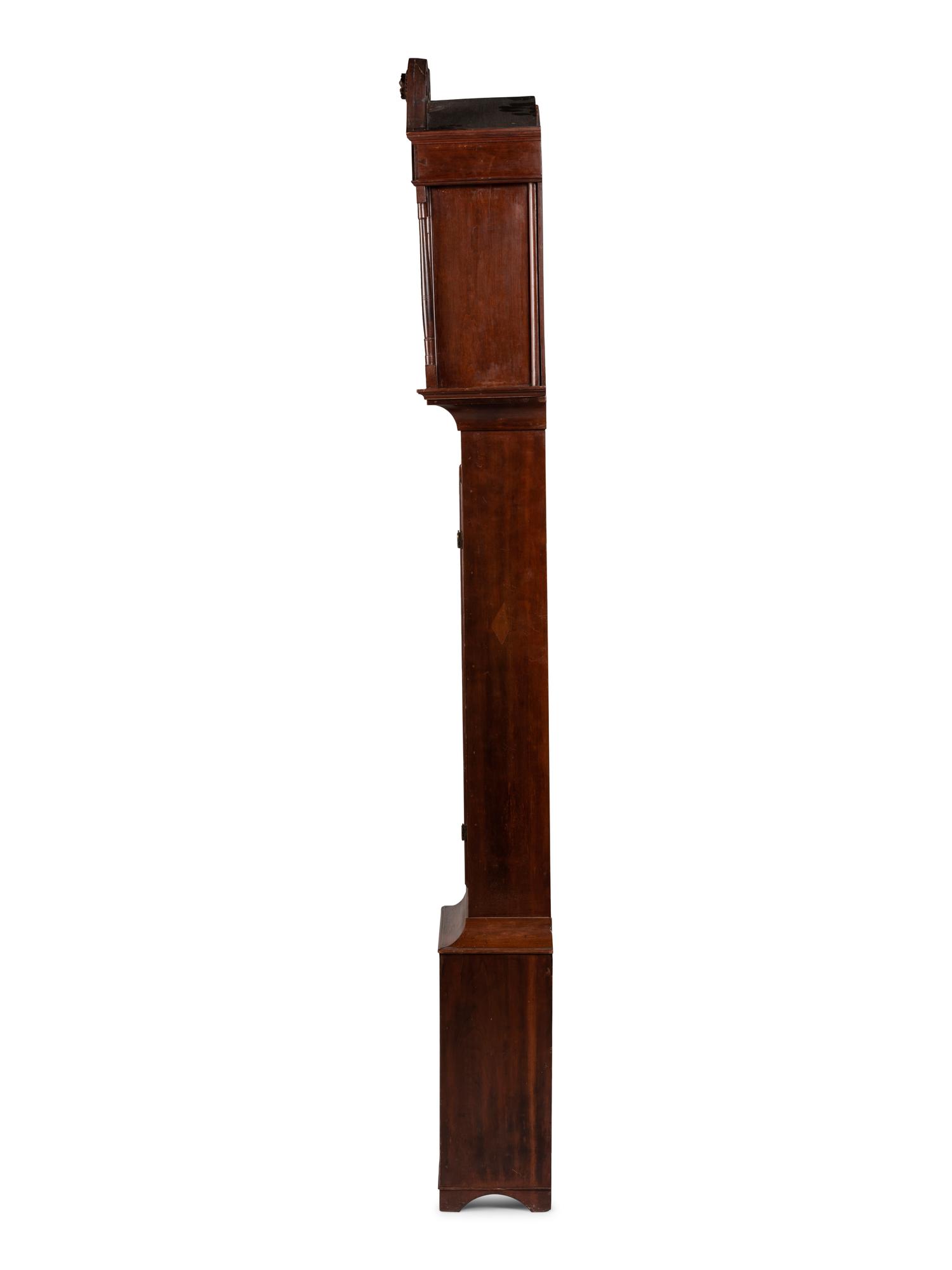 A Federal Carved Cherrywood Tall Case Clock