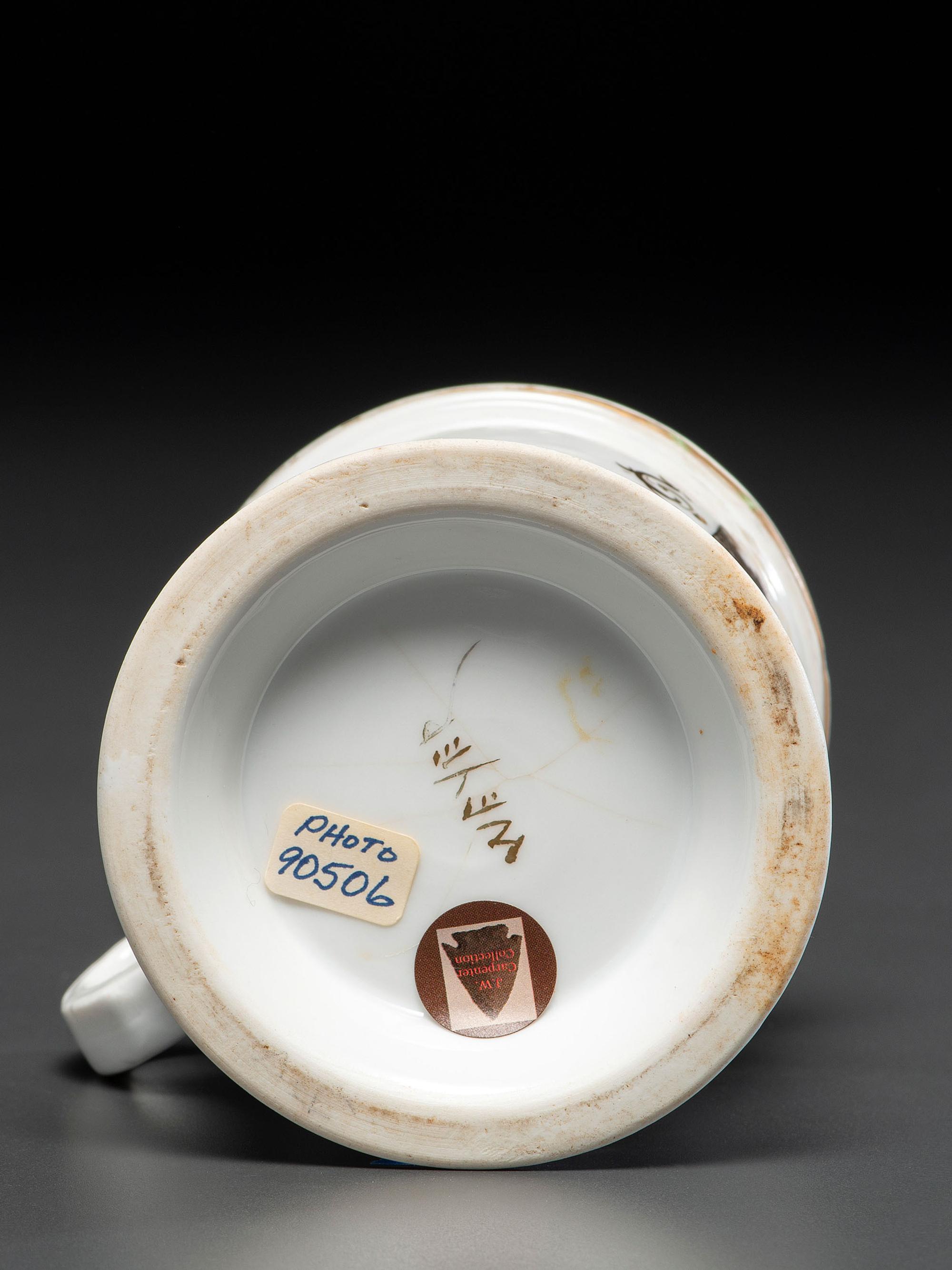 A Photographic Transfer Porcelain Shaving Mug Depicting a Man Driving a Horse and Buggy