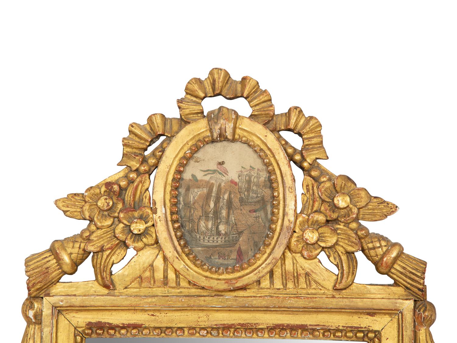 A Pair of Italian Carved Giltwood Mirrors