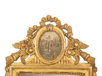 A Pair of Italian Carved Giltwood Mirrors
