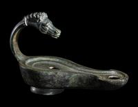 A Roman Bronze Horse Head Oil Lamp