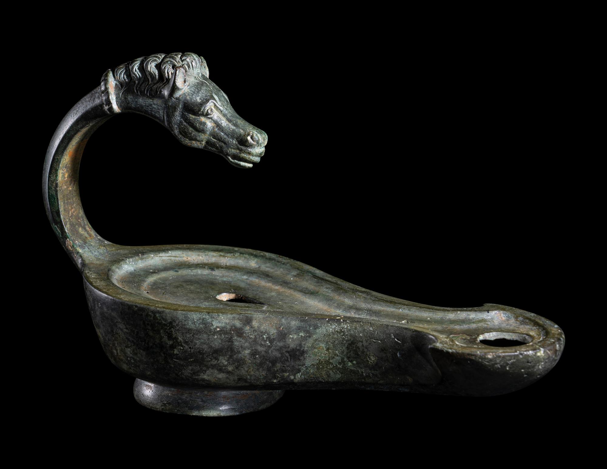 A Roman Bronze Horse Head Oil Lamp