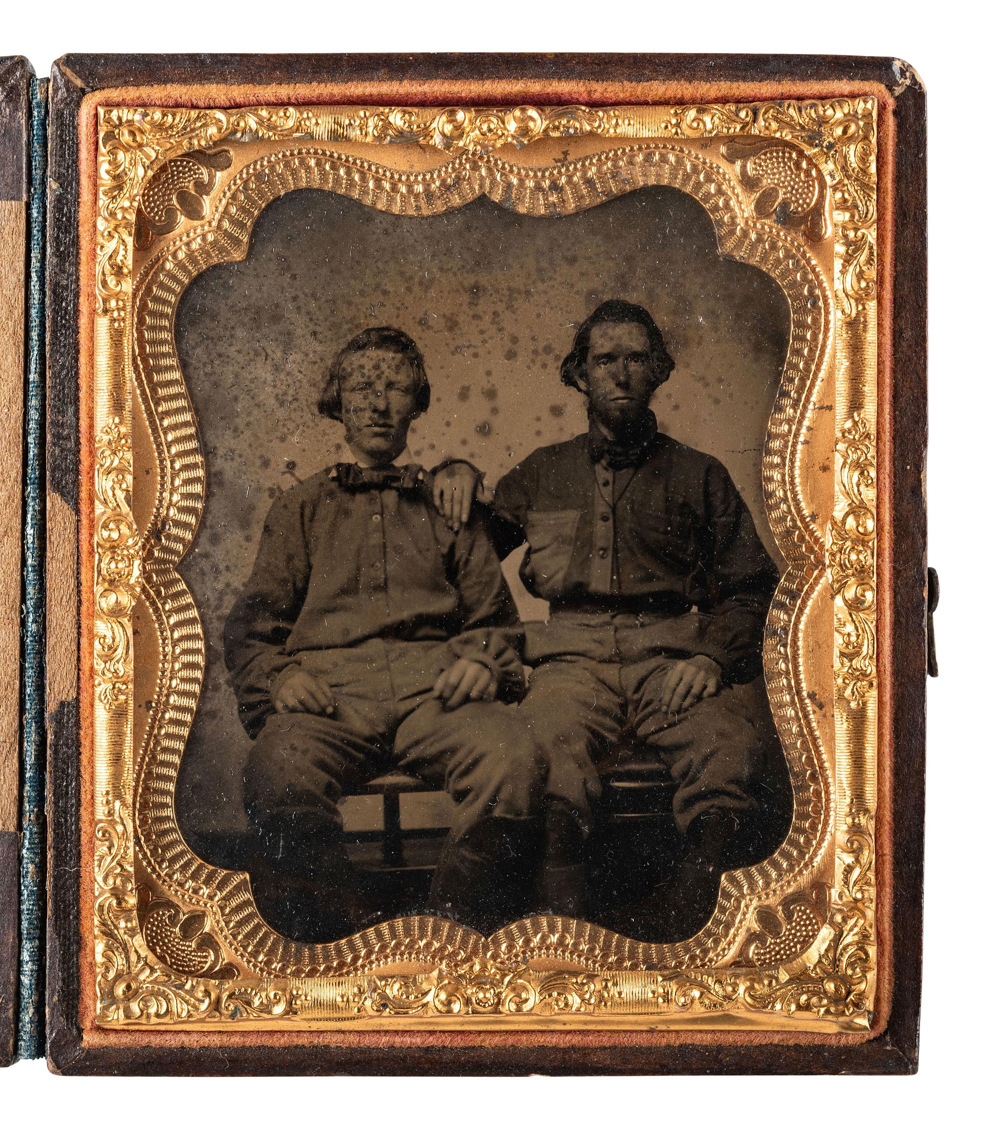 [CIVIL WAR]. Sixth plate ambrotype featuring a pair of Confederate pards wearing early battle shirts.