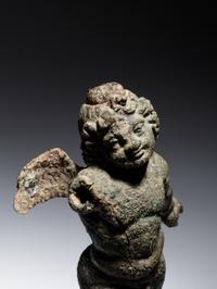 A Roman Bronze Figure of Eros