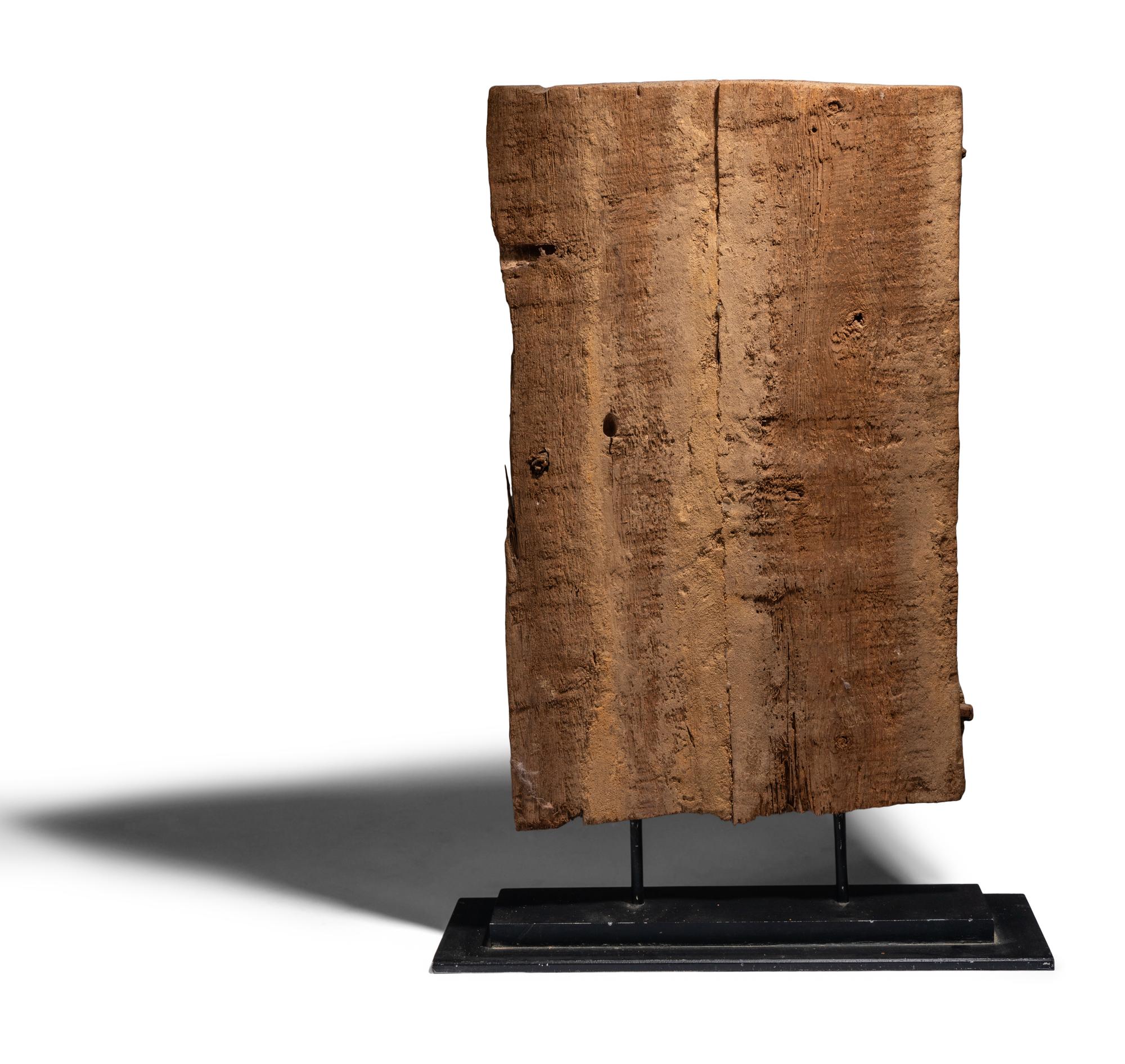 An Egyptian Painted Wood Sarcophagus Fragment with a Boat Scene
