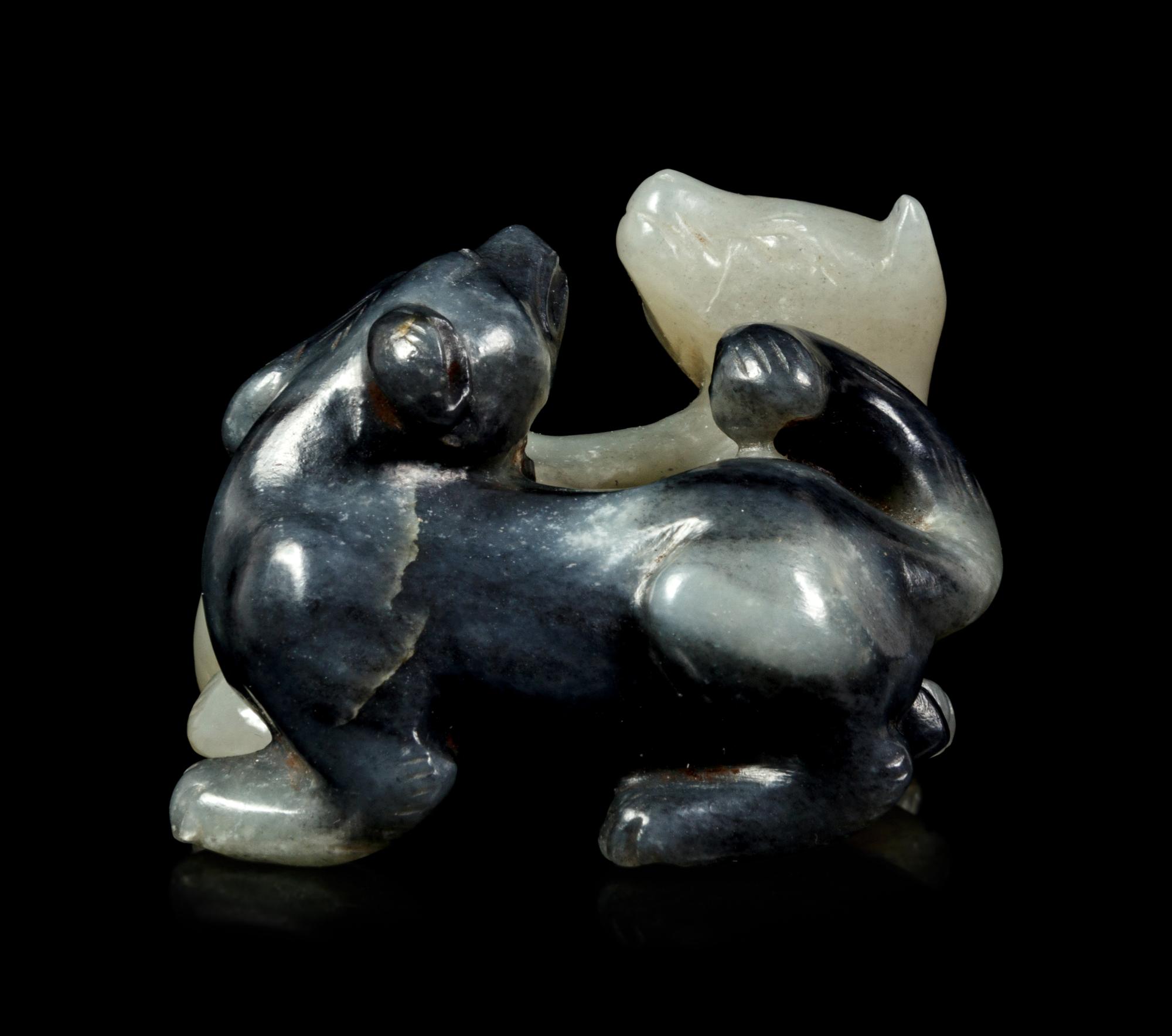 A Grey and White Jade Carving of Double Badgers