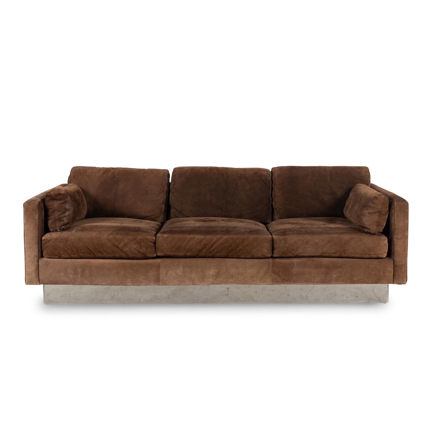 A Suede Upholstered Chromed- Metal Three-Cushion Sofa