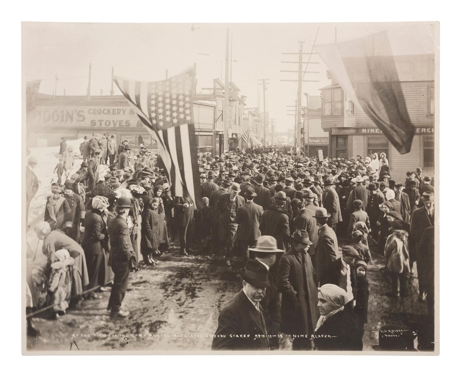 Alaska A group of 3 photographs of Alaska scenes incl. the finish line of the 6th Annual All Alaska Sweep Stakes in Nome. 1910s.