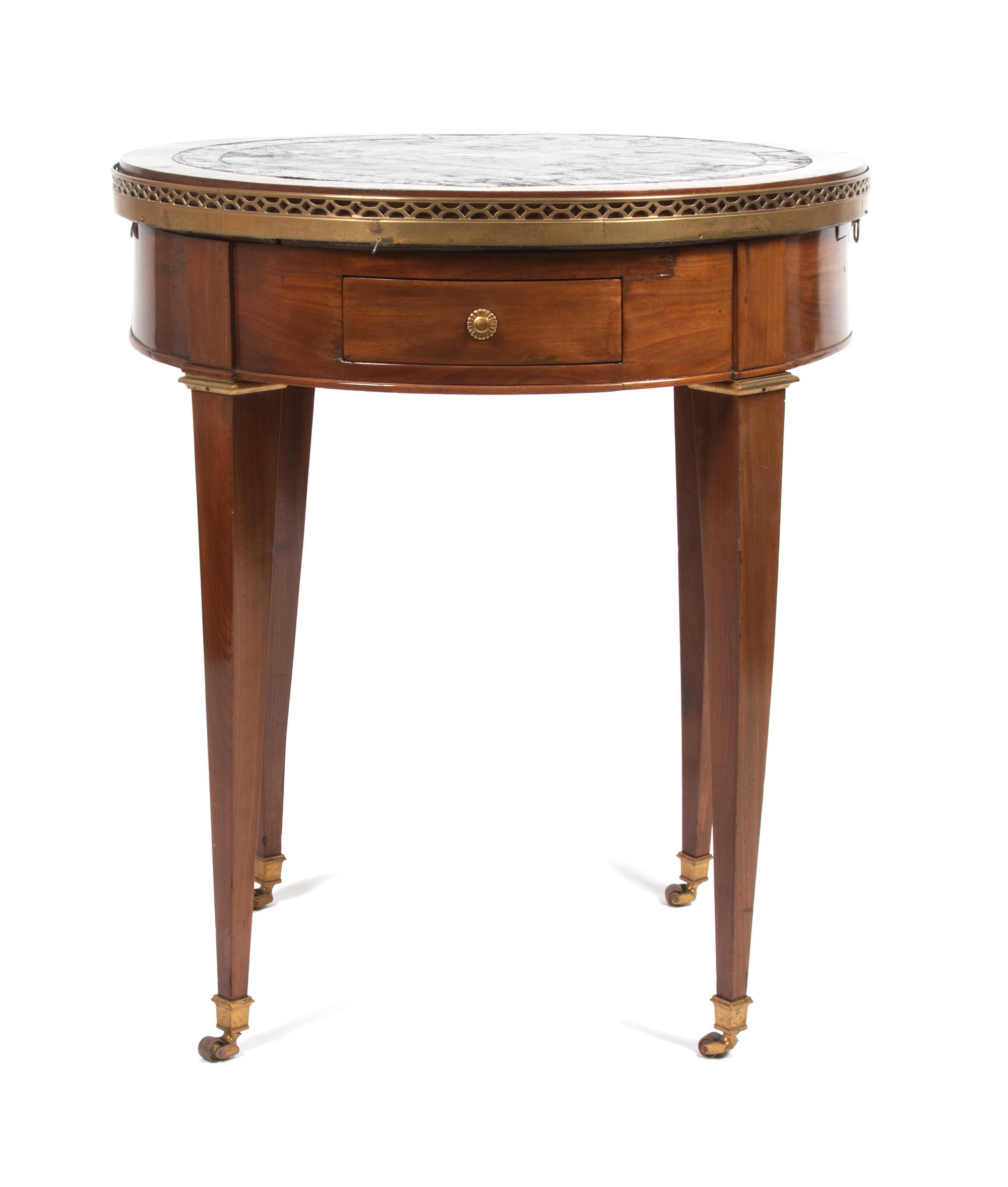 An Empire Style Drum Table Height 29 x diameter 25 1/2 inches.
