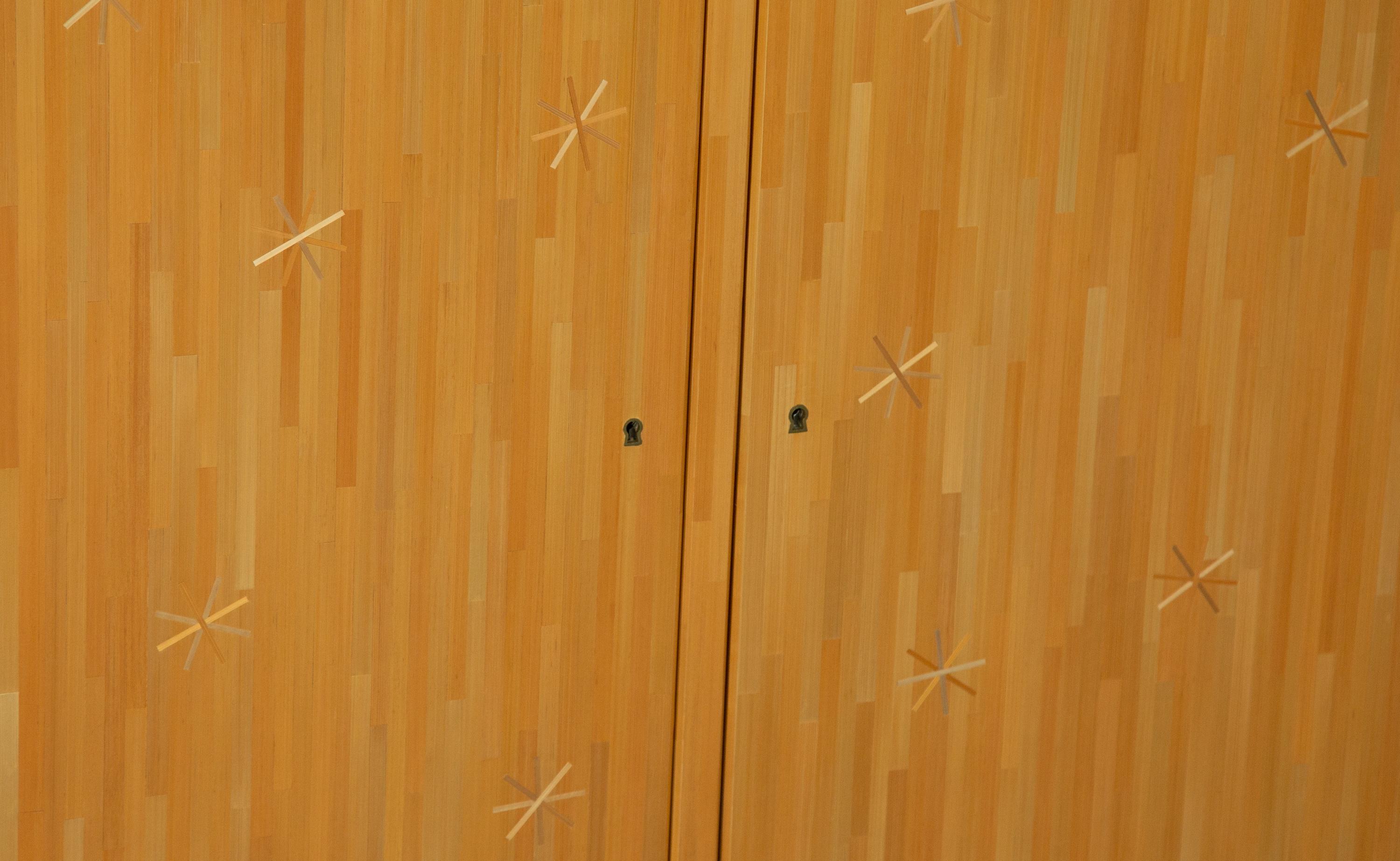 A Linear Straw Marquetry Etoile Sideboard with Star Inlay Designed by Rémi Tessier after Jean Royère