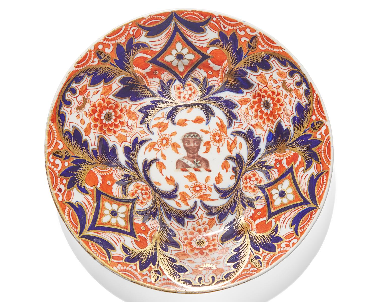 A rare set of four Derby porcelain plates in the Imari palette, circa 1820