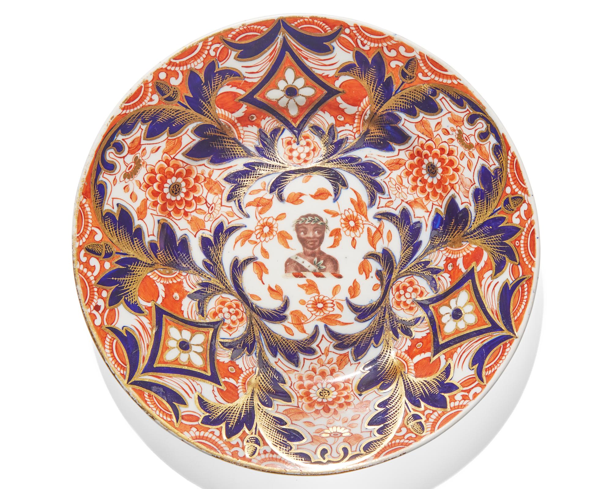 A rare set of four Derby porcelain plates in the Imari palette, circa 1820
