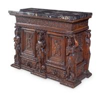 A Renaissance Revival Carved Walnut Marble-Top Cabinet