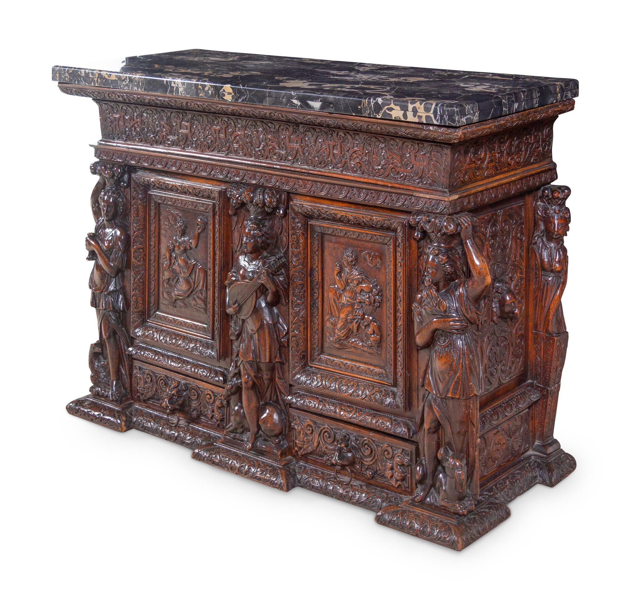 A Renaissance Revival Carved Walnut Marble-Top Cabinet