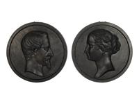 A Pair of Patinated Iron Portrait Plaques of Napoleon III and His Wife Eugenie