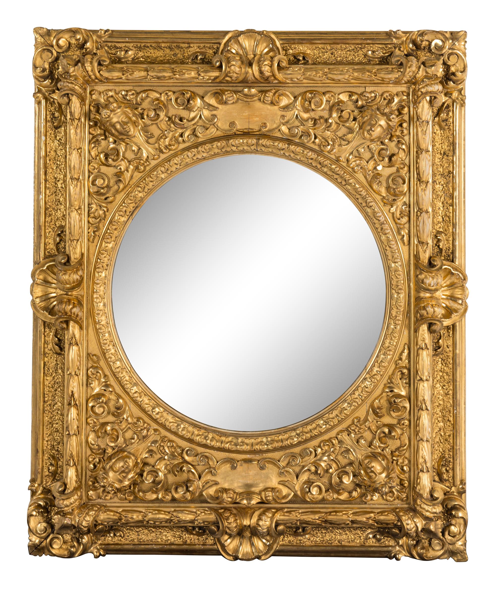 A Baroque Style Giltwood and Gesso Mirror