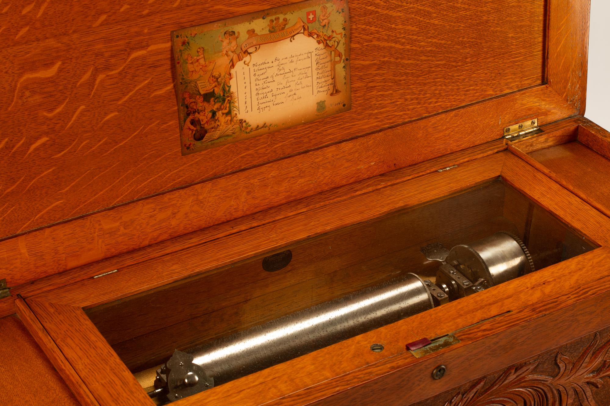 A Swiss Oak-Cased Cylinder Music Box and an Associated Stand