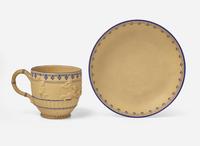 A Wedgwood Encaustic Decorated Caneware "Bacchanalian Boys" Cup and Saucer, UK, circa 1790