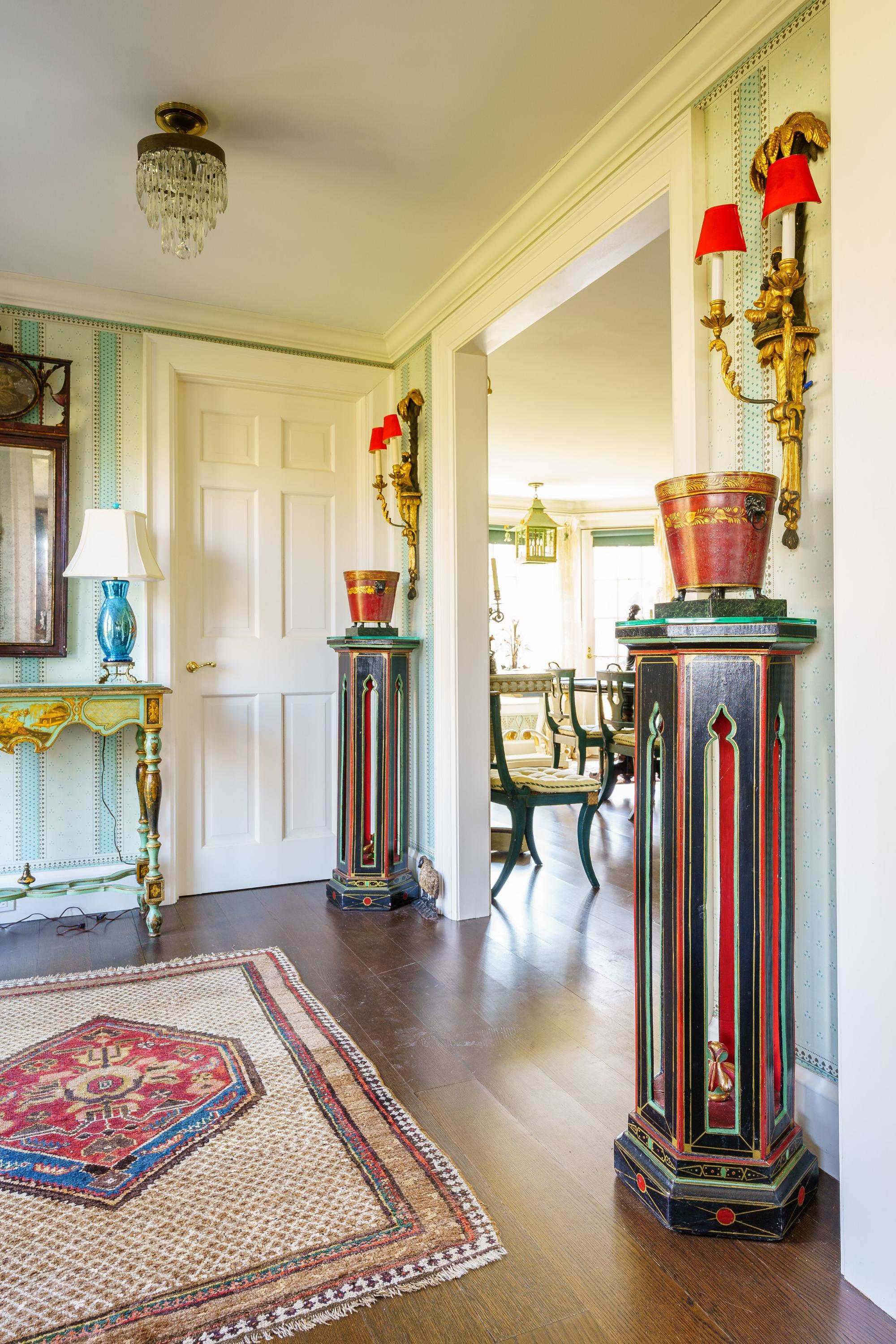 A Pair of Painted and Parcel Gilt Carved Wood Sconces