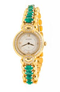 An 18 Karat Yellow Gold, Diamond and Emerald "Paradiso" Wristwatch, Bucherer, 40.50 dwts.