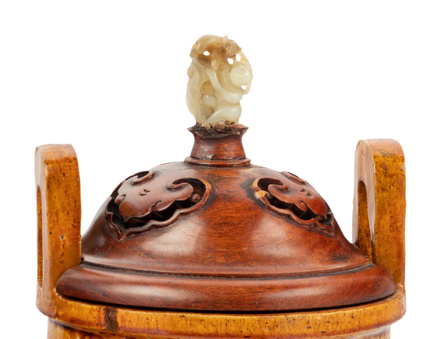 A Pair of Chinese Sancai Glazed Porcelain Tripod Ding Vessels