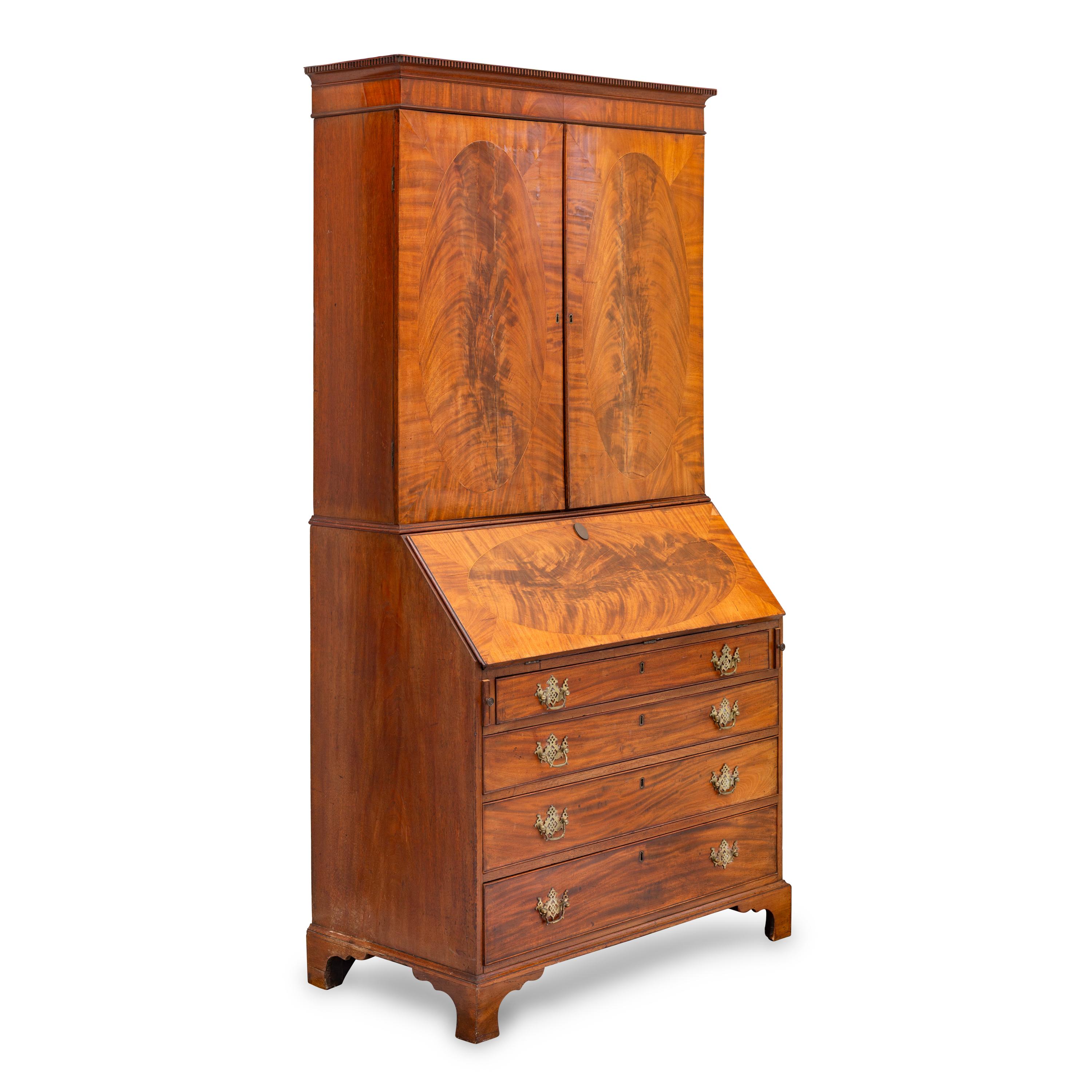 A George III Figured Mahogany Bureau Cabinet