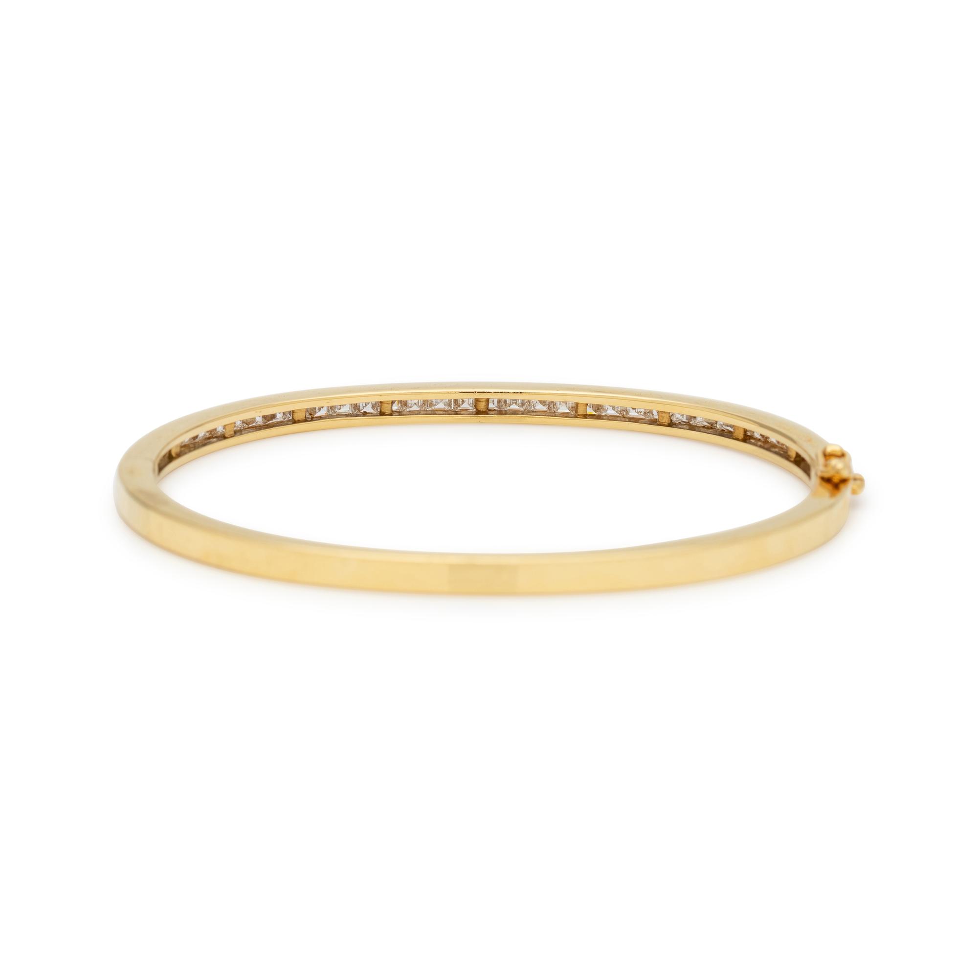SCHLUGER, DIAMOND, SAPPHIRE AND EMERALD BANGLE BRACELET SET