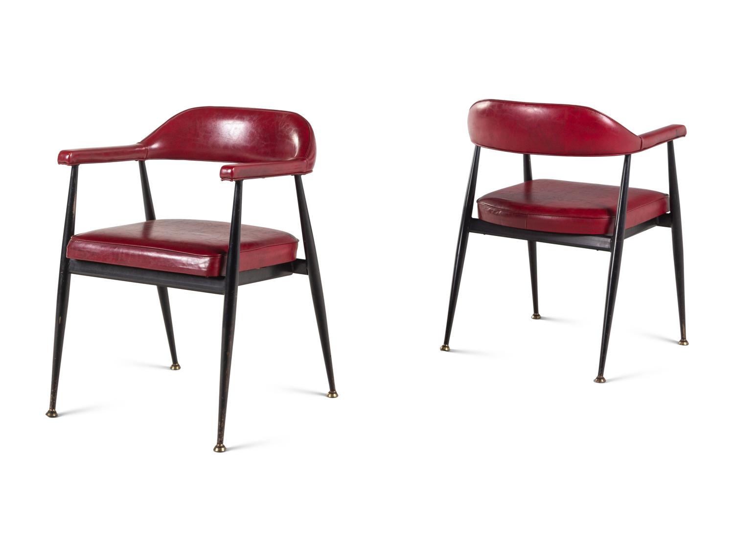 A Pair of Modernist Vinyl Armchairs