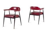 A Pair of Modernist Vinyl Armchairs