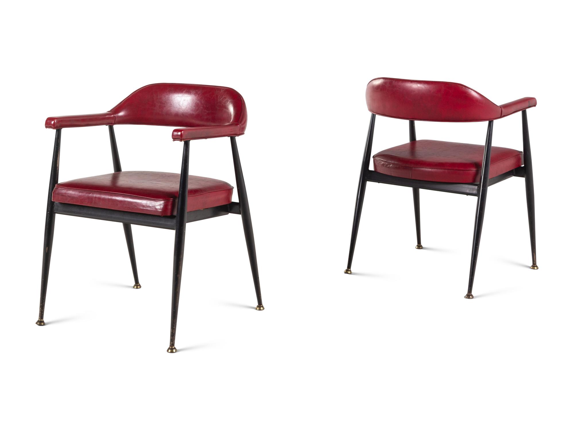 A Pair of Modernist Vinyl Armchairs