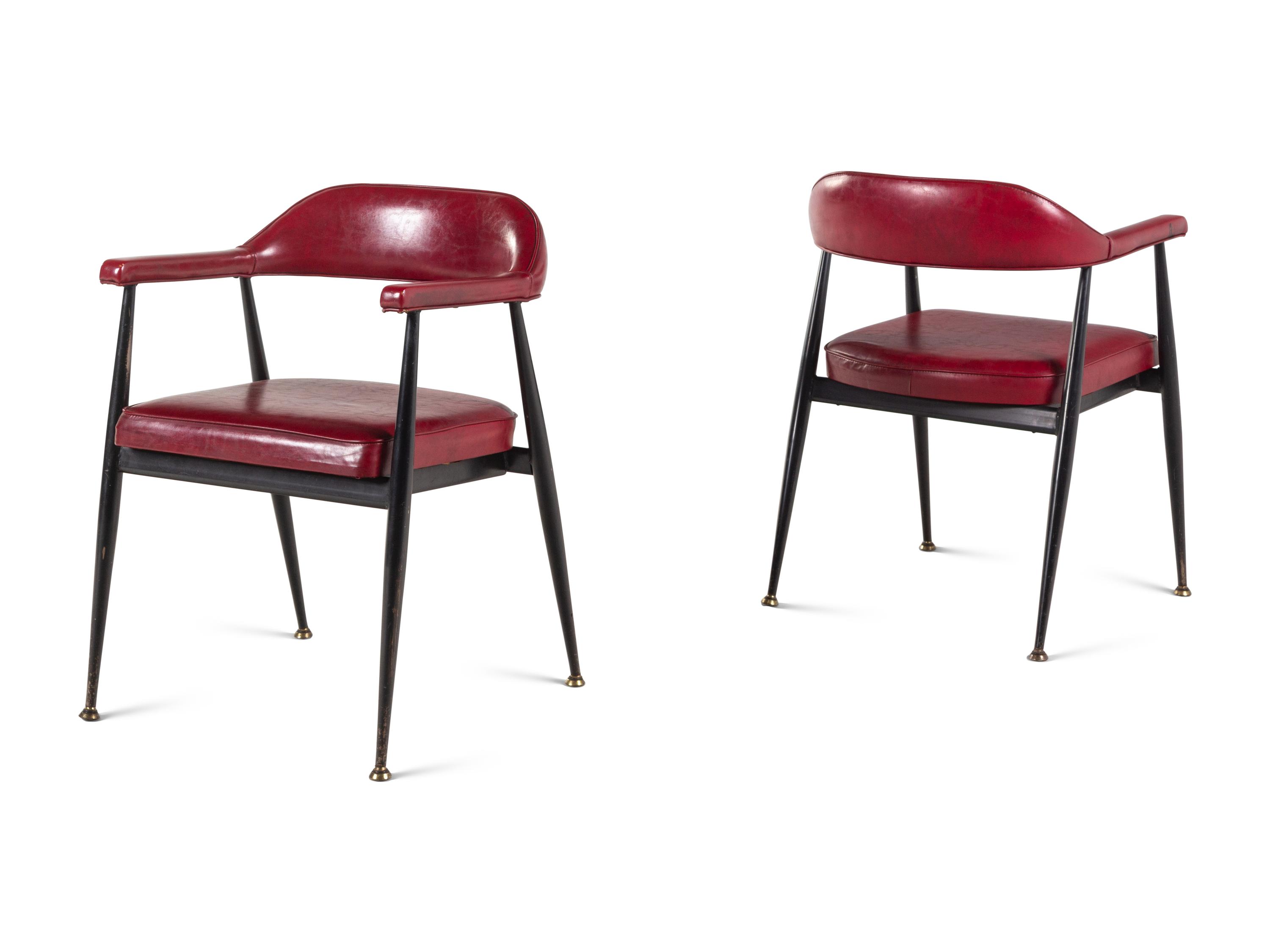 A Pair of Modernist Vinyl Armchairs