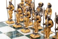 A Giuseppe Vasari Gilt and Silvered Bronze Medieval Chess Set