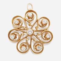 A 14K yellow gold and diamond pendant/brooch
