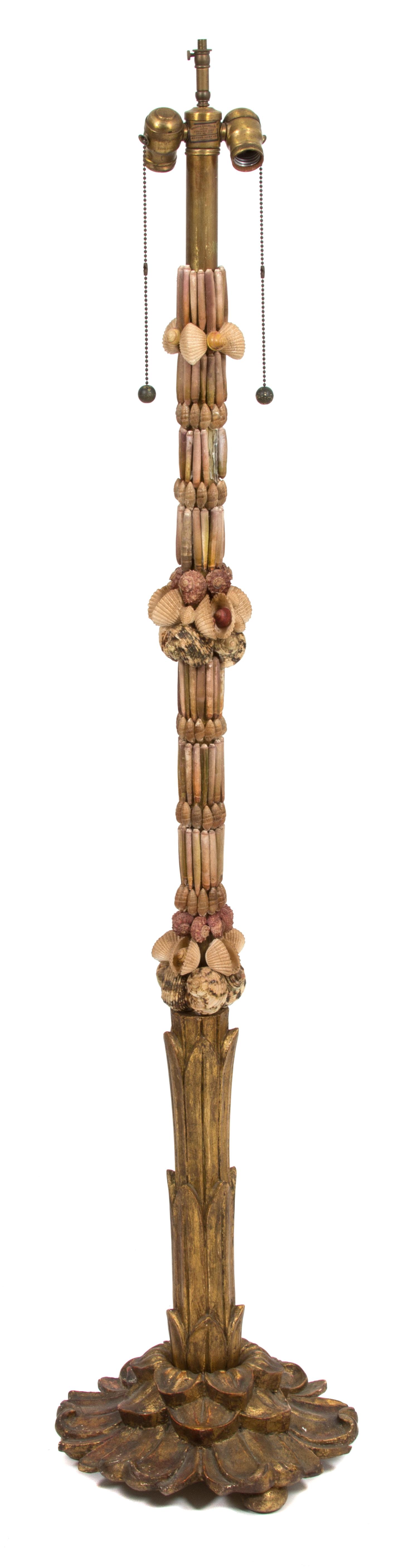A Shell Encrusted Floor Lamp Height 59 inches. — 20TH CENTURY