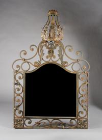 A Wrought Iron Framed Mirror, Height 53 x width 34 inches.