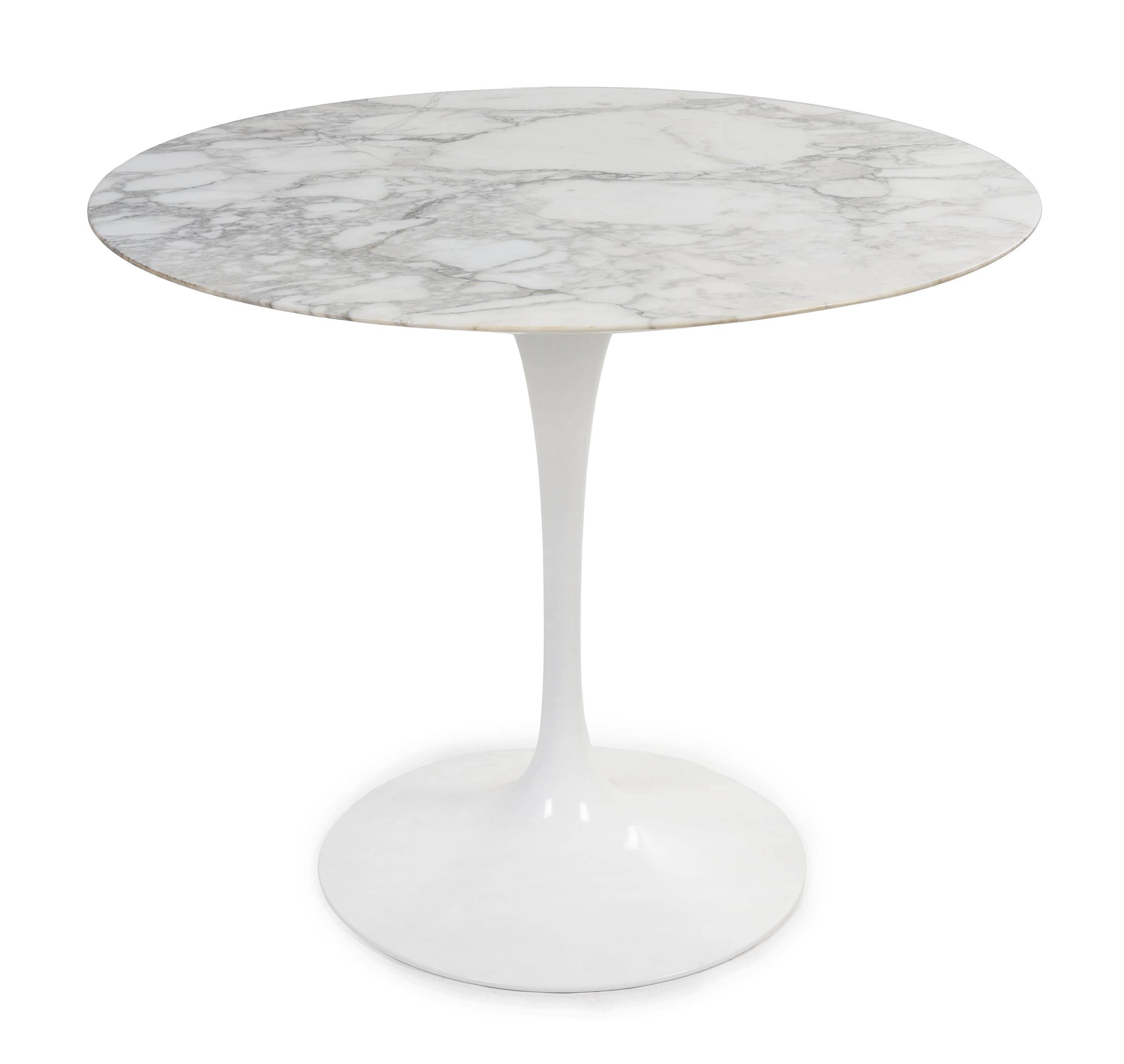 An Eero Saarinen Tulip Table Height 30 x diameter 36 inches.