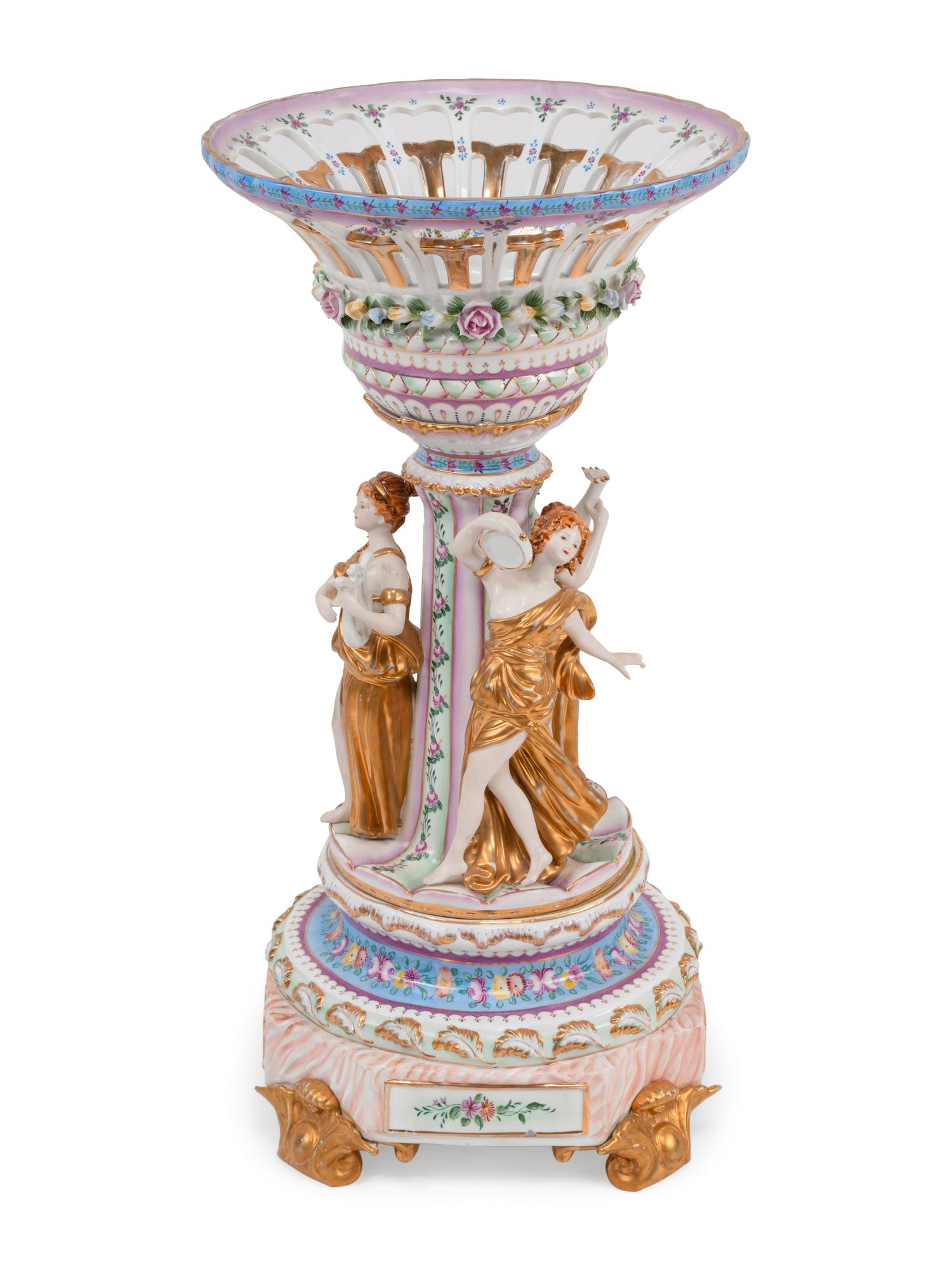 A Large German Porcelain Figural Centerpiece