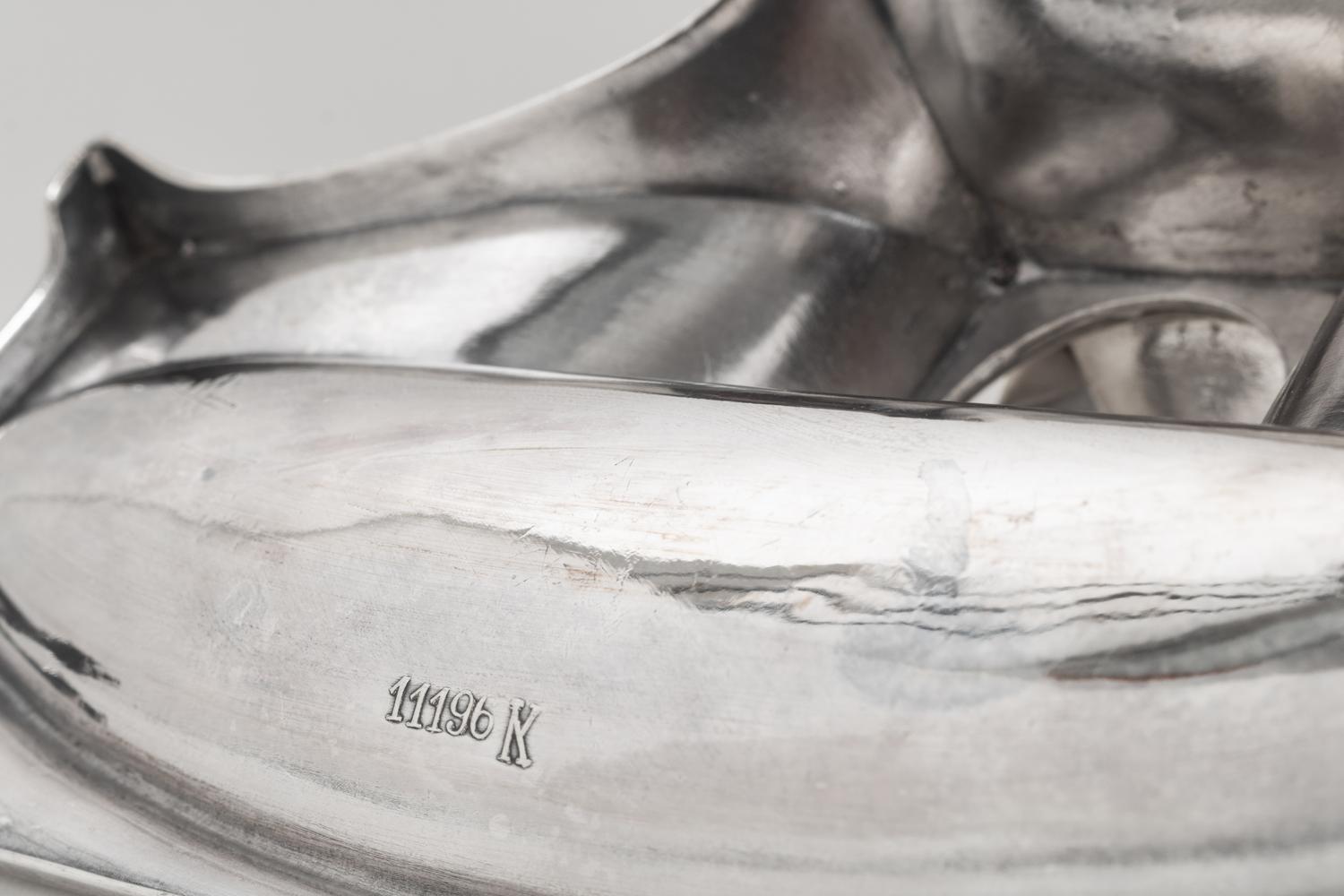 A Continental Silver Inkwell and Rocker Blotter