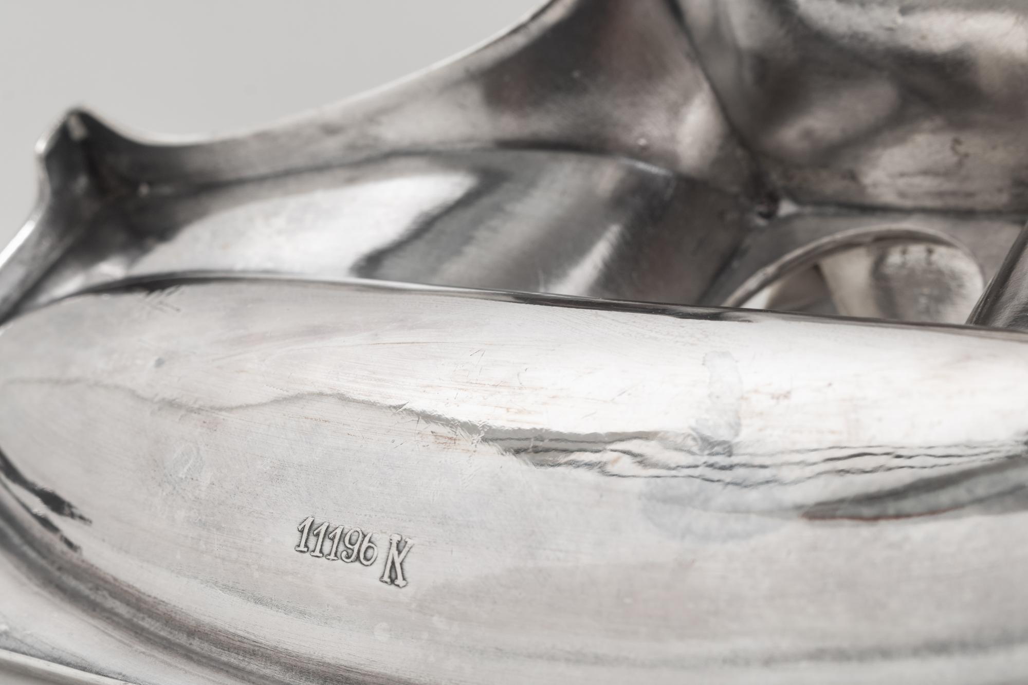 A Continental Silver Inkwell and Rocker Blotter