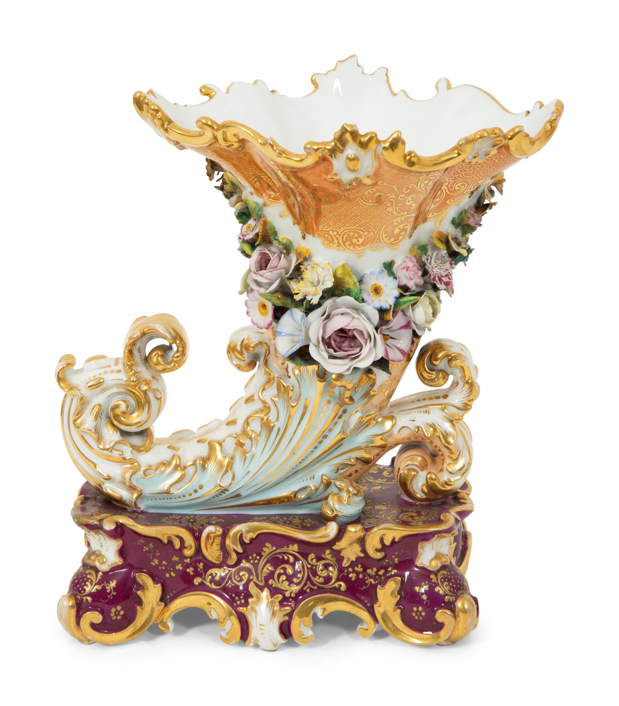 A Signed Jacob Petit Porcelain Cornucopia Vase on a Serpentine Base